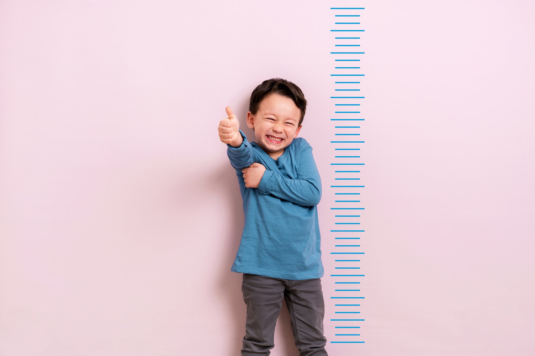 Child measuring his height